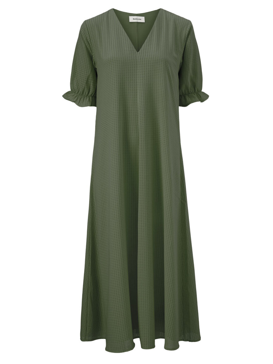 diktator kan opfattes Passende Modström. Lækker lang kjole tilbage i en ensfarvet model med tone i tone  tern. K
